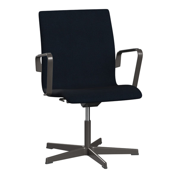 Navy blue swivel chair with a sleek design and gray metal accents, ideal for modern office decor.