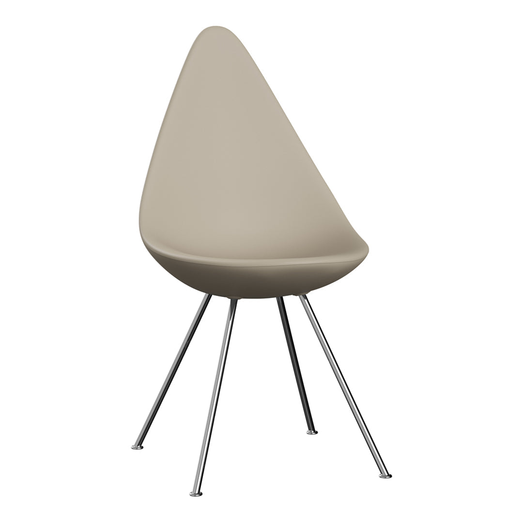 Beige teardrop chair with sleek chrome legs, featuring a smooth, minimalist design. Ideal for modern decor.
