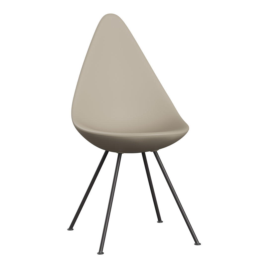 Beige teardrop chair with sleek black legs, showcasing a minimalist and modern design. Perfect for contemporary decor.