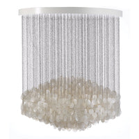 Translucent white pendant light with a modern, layered design featuring shimmering beads and delicate draping.