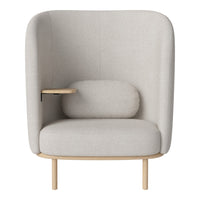 Light gray upholstered chair with a smooth texture and minimalist design, featuring a curved back and wood accents.