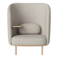 Light gray upholstered armchair with rounded contours and natural wood legs, featuring a minimalist design.