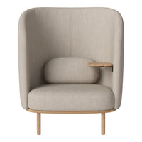 Beige upholstered armchair with a smooth texture and a minimalist wooden frame. Elegant and contemporary design.