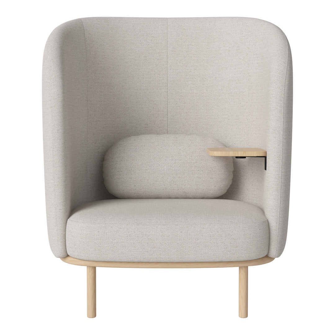 Light gray upholstered chair with smooth curves and a minimalist wooden base, featuring a matching lumbar pillow.