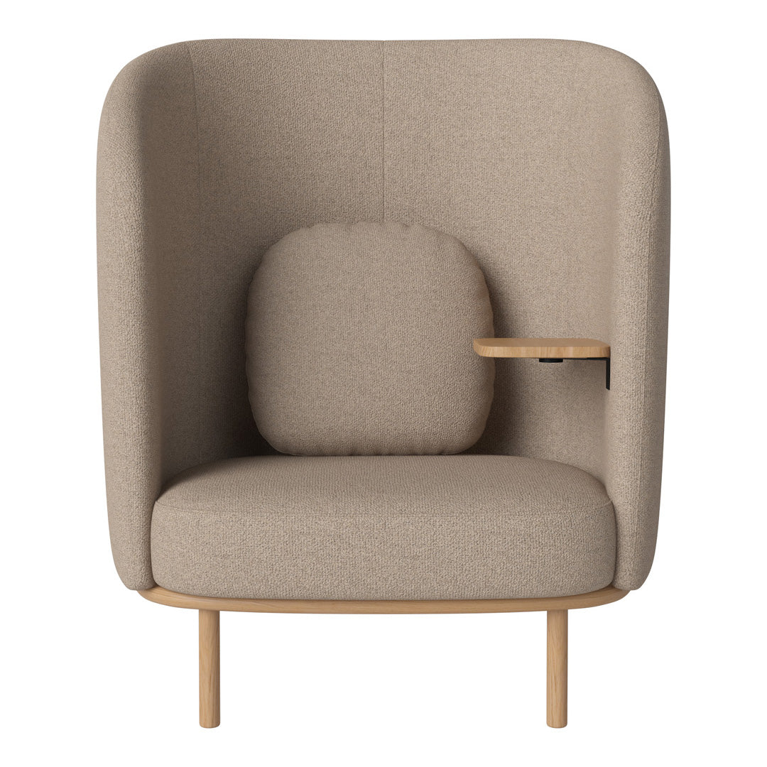 "Beige upholstered armchair with a rounded back and wooden legs, featuring a soft, minimalist design."