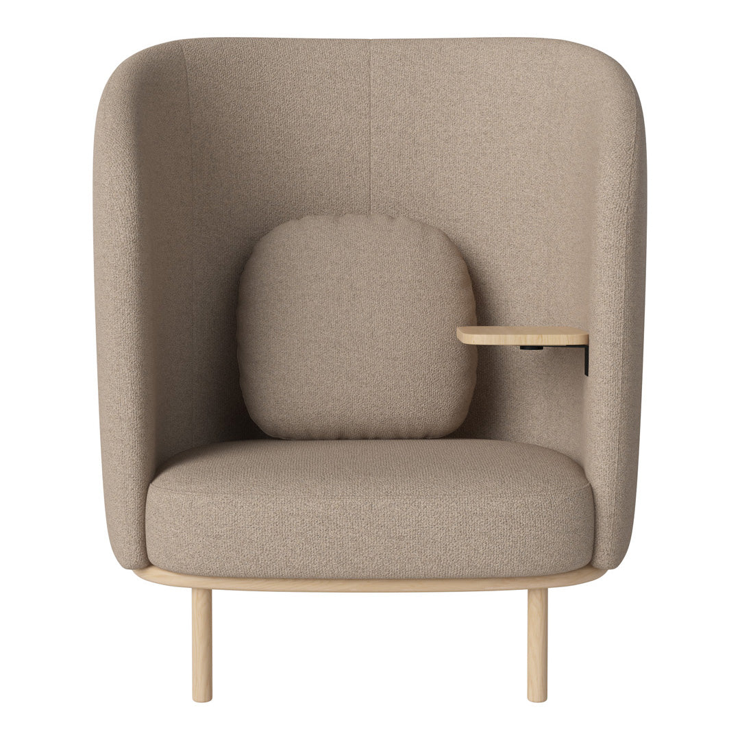 Beige upholstered armchair with rounded edges and minimalistic wooden legs. Modern, neutral tones ideal for cozy spaces.