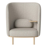 Light gray upholstered chair with a smooth, minimalist design and natural wood accents. Cozy and modern appearance.