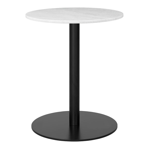 Round table featuring a white marble top and a sleek black metal base, perfect for modern decor.
