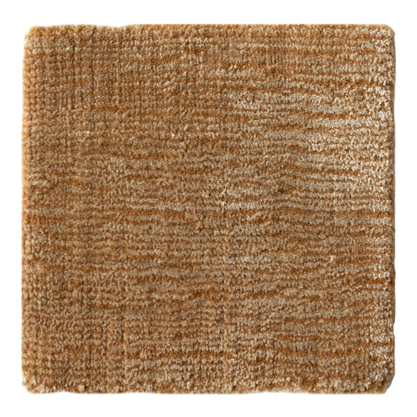 Textured square rug in warm brown tones with subtle light beige highlights and a natural pattern.