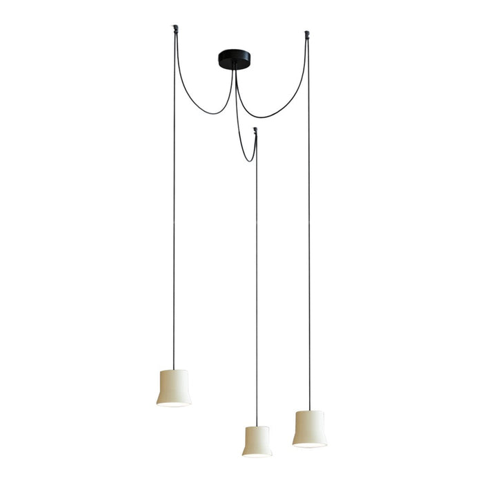 Modern black pendant light with three minimalist cream shades and sleek wires, perfect for contemporary decor.