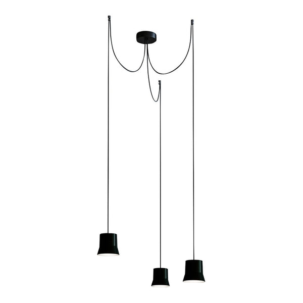 Black pendant lights with sleek, modern design, featuring smooth finishes and contrasting cables. Perfect for stylish decor.