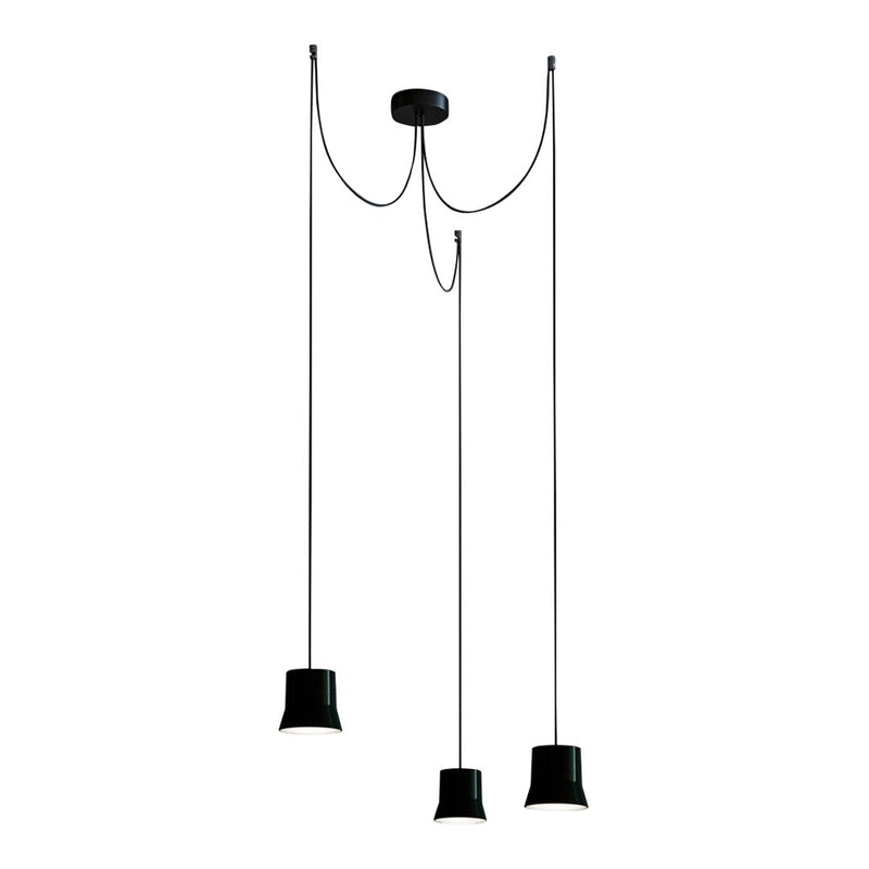 Black pendant lights with sleek, modern design, featuring smooth finishes and contrasting cables. Perfect for stylish decor.