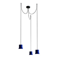 Three pendant lamps featuring deep blue shades and a sleek black suspension design. Modern minimalist aesthetic.