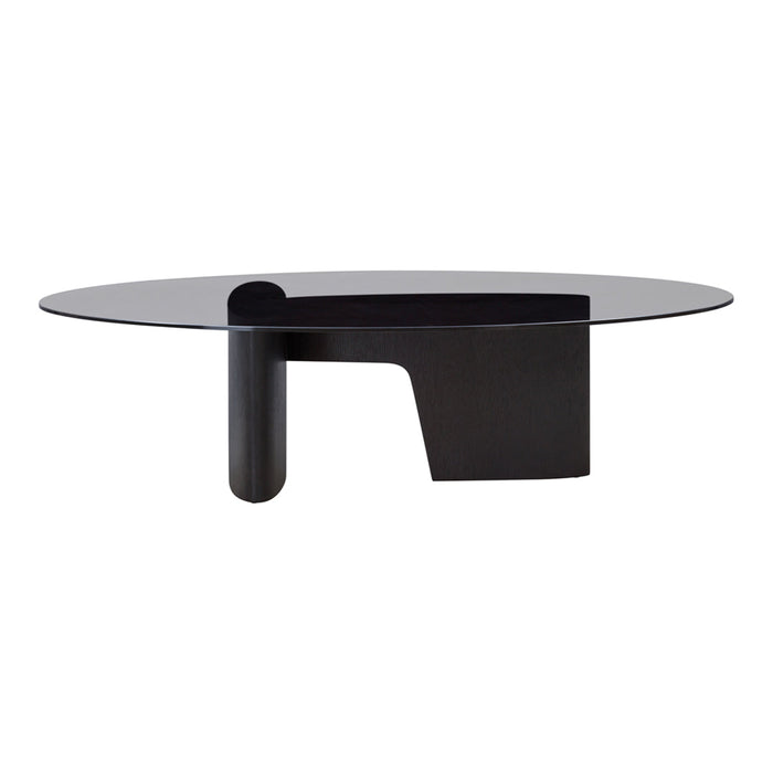 Modern oval coffee table with a sleek black base and a transparent glass top, showcasing minimalist design.