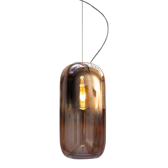 Amber glass pendant lamp with a sleek, modern silhouette and warm lighting perfect for contemporary spaces.