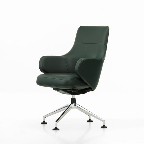 Mid-century modern chair in deep green leather with sleek chrome base, featuring smooth, minimalist lines.