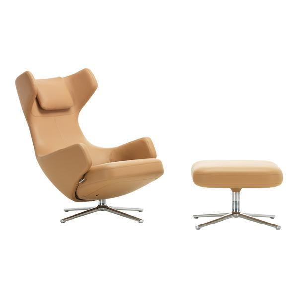 Stylish tan ergonomic chair with matching ottoman on a sleek metal base, perfect for modern interiors.