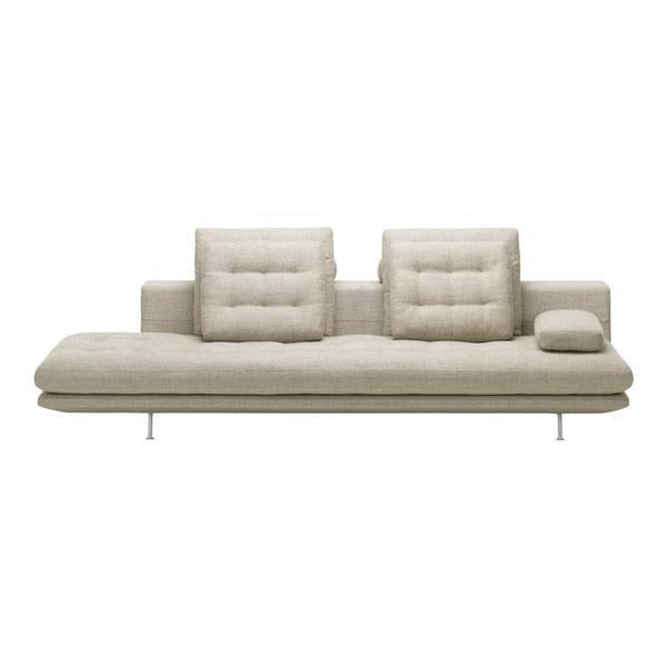 Beige modern sofa with tufted cushions and a sleek design, featuring a smooth texture and minimalist lines.
