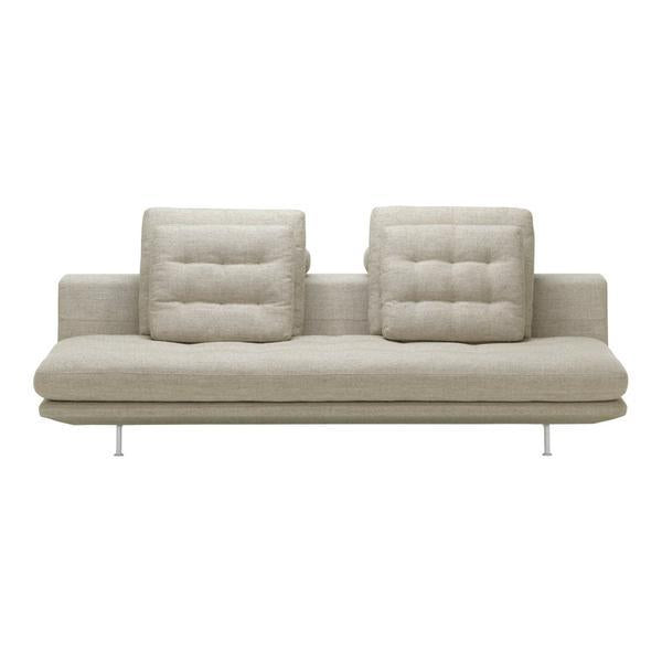 Light beige sofa with tufted cushions and minimalist design, perfect for modern living spaces.