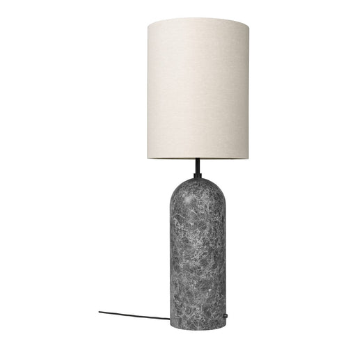 Table lamp with a gray textured base and white lampshade on a white background
