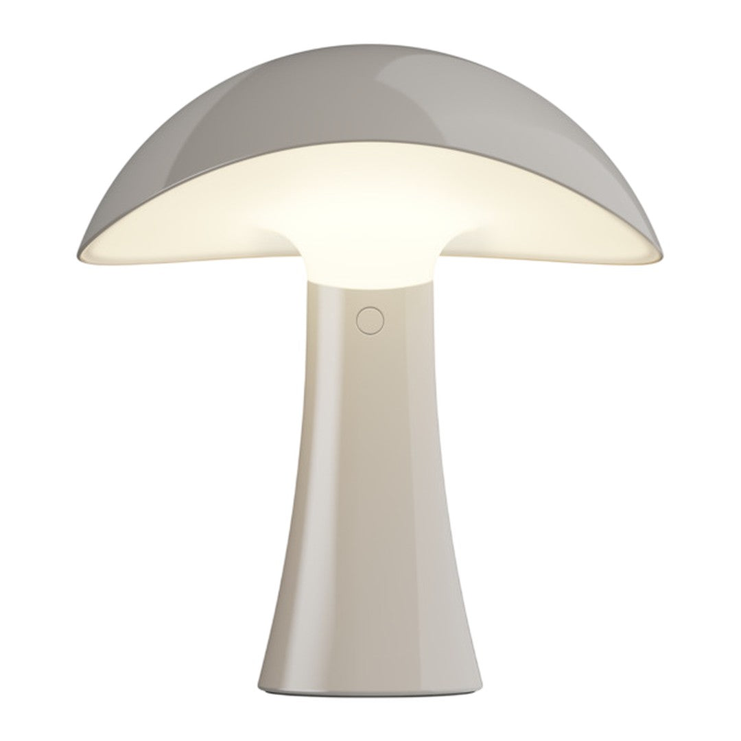 White mushroom-shaped lamp with a smooth, glossy finish and a soft, warm glow. Minimalist design perfect for any decor.