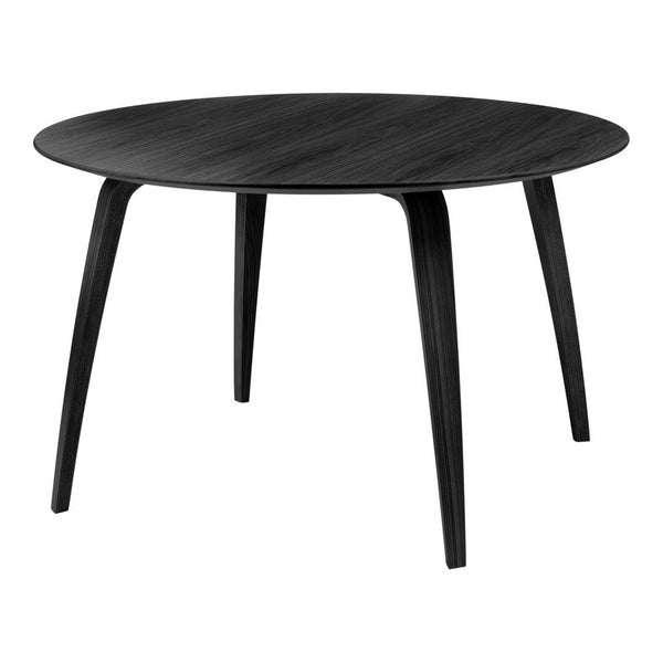 Round black wooden table with a sleek, smooth finish and minimalist design, featuring a subtle wood grain pattern.
