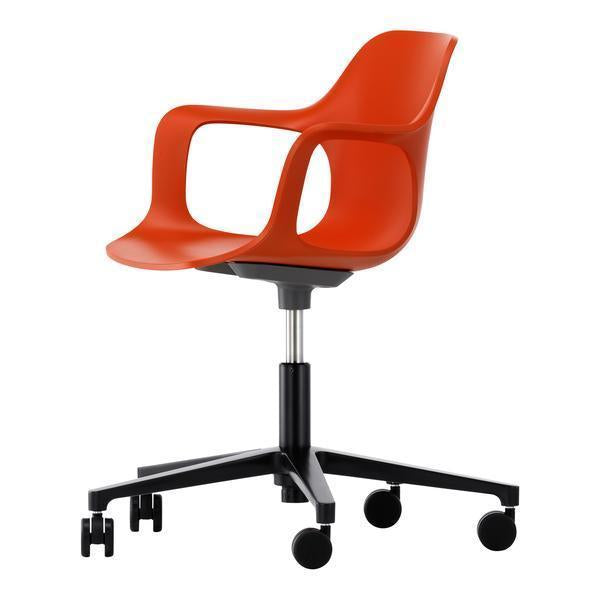 Bright orange ergonomic chair with a sleek design and black rolling base. Ideal for modern office spaces.