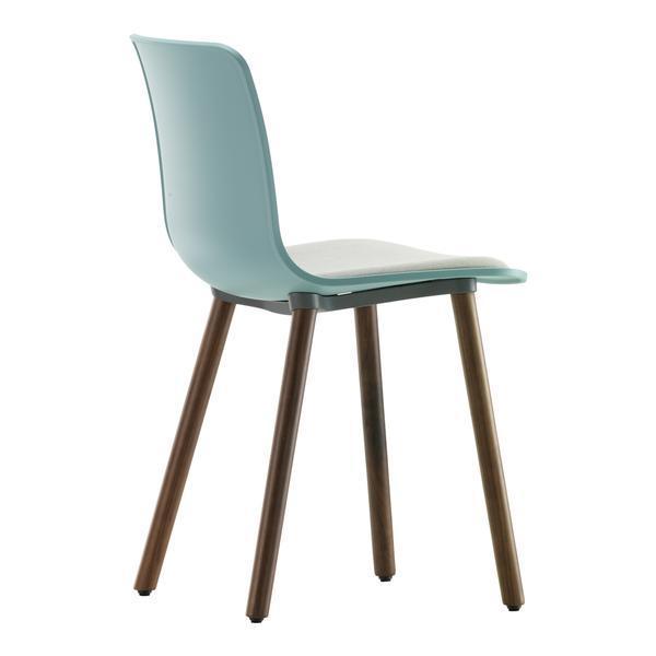 Aqua blue chair with smooth surface and natural wood legs, perfect for modern decor.