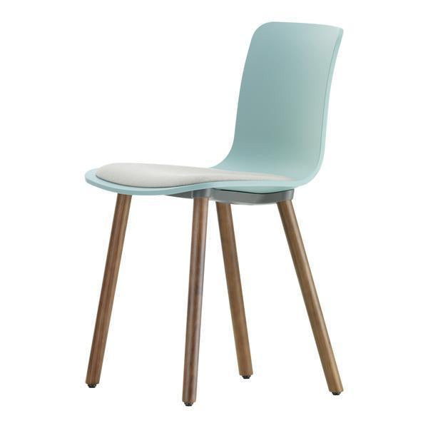 Light blue chair with a smooth finish and natural wood legs, featuring a minimalist and modern design.