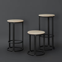 Set of three black metal stools with natural wood tops, featuring clean lines and a minimalist design.