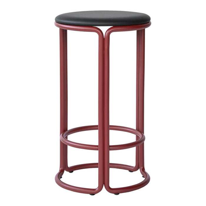 Red metal bar stool with a sleek black round seat, featuring a modern minimalist design and simple circular patterns.