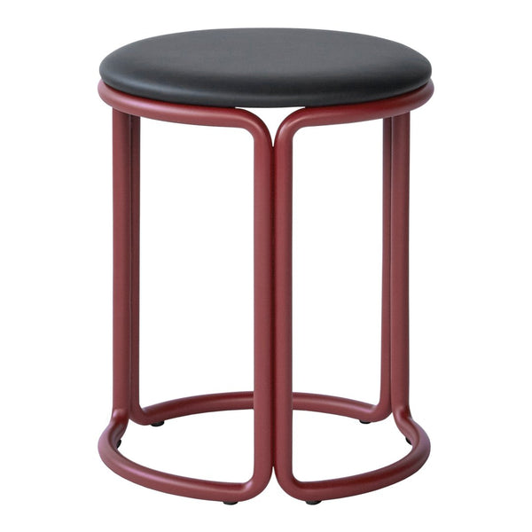 "Round black padded stool with a sleek red metal base, featuring a minimalist design and modern aesthetic."