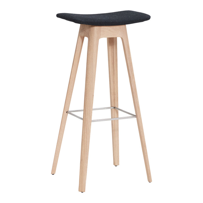 Modern bar stool featuring a sleek black seat and natural wood legs with a minimalist design.