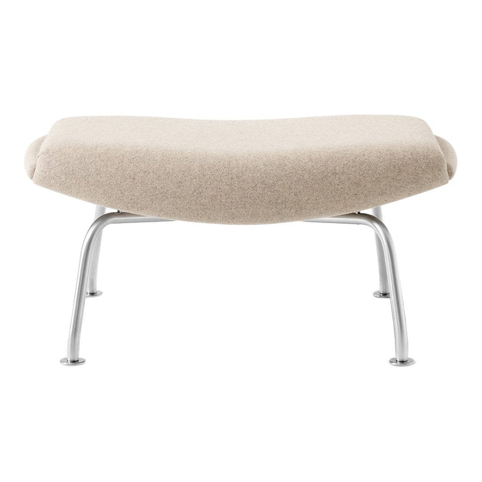 Light beige upholstered ottoman with a smooth, curved shape and sleek silver legs. Chic, minimalist design.
