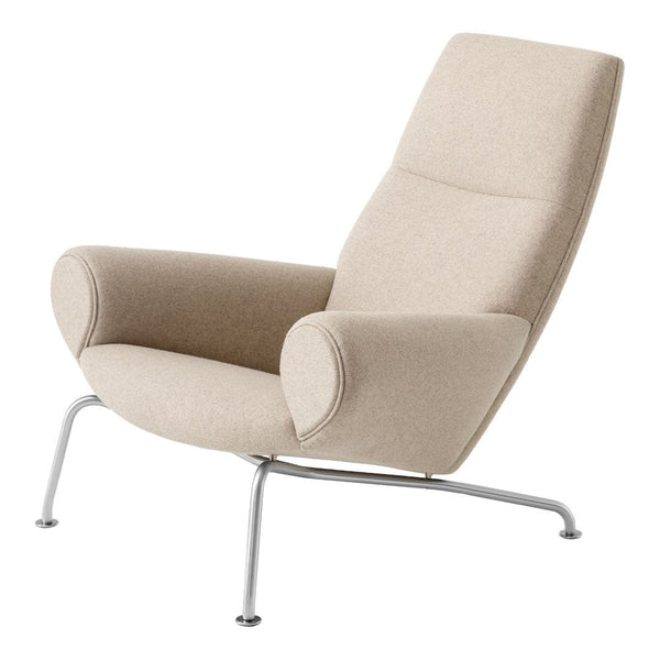 Light beige armchair with a smooth fabric finish and minimalist silver legs, showcasing a sleek modern design.