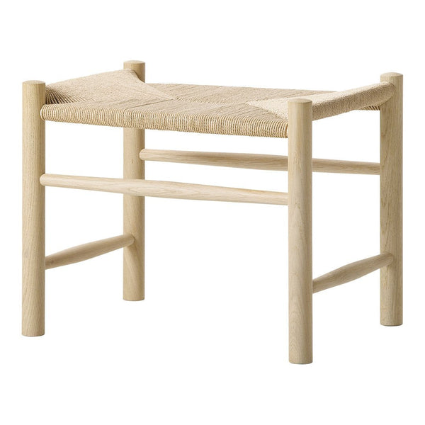 Natural wood bench with a light beige woven seat, featuring a minimalistic design and a simple, elegant pattern.