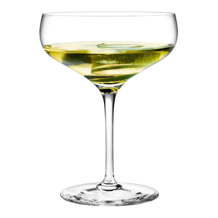 Elegant clear glass coupe with a bright yellow liquid and clean, smooth lines. Ideal for cocktails or desserts.