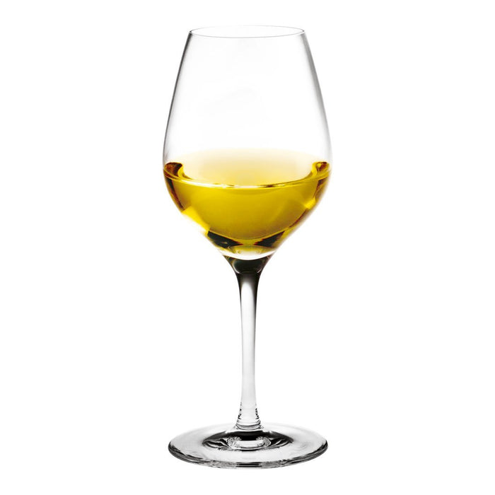 Clear glass wine glass filled with golden yellow liquid, showcasing a sleek silhouette and elegant base.