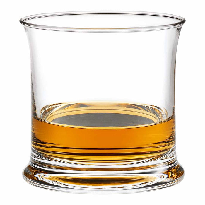 Clear glass whiskey tumbler with a vibrant amber liquid, showcasing smooth curves and a polished edge.