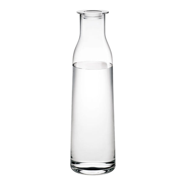Clear glass water carafe with a sleek, modern design and smooth cylindrical shape. Ideal for any table setting.