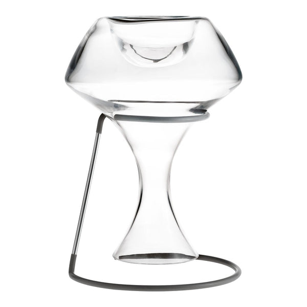 Clear glass vase with a sleek, modern design and minimalist metal stand, featuring smooth curves and a polished finish.
