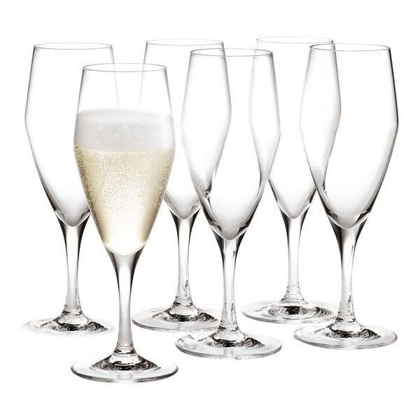 Set of six clear champagne flutes, featuring elegant tall stems and classic bowl shapes, showcasing sparkling bubbles.