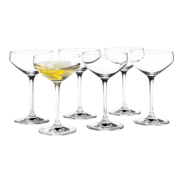 Set of six elegant clear glass coupe glasses, featuring a sleek design perfect for cocktails and celebrations.