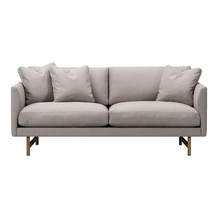 Light gray upholstered sofa with soft cushions and sleek wooden legs, perfect for modern living spaces.
