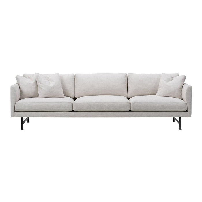 Modern light gray sofa with smooth upholstery and black metal legs, featuring plush, detachable accent pillows.