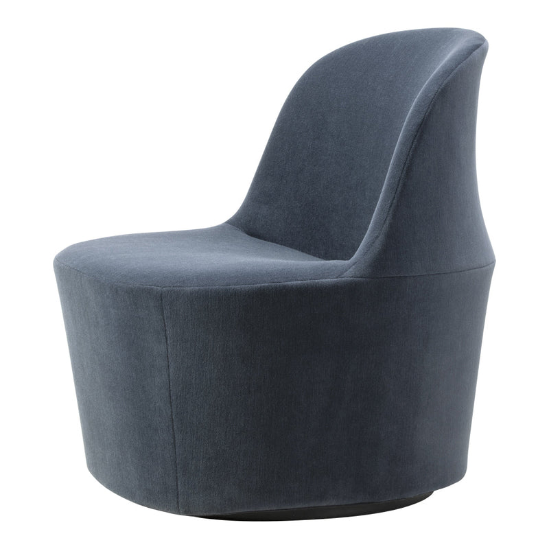 "Modern round accent chair in soft dark gray velvet with smooth, sleek contours and a minimalist design."