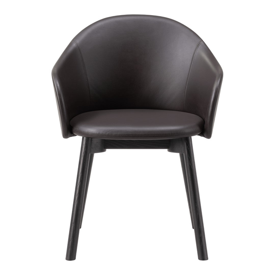 Brown leather chair with rounded back and smooth finish, featuring dark wooden legs for a modern aesthetic.