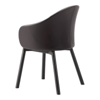 Sleek black upholstered chair with a smooth finish and dark wooden legs, featuring a modern curved design.