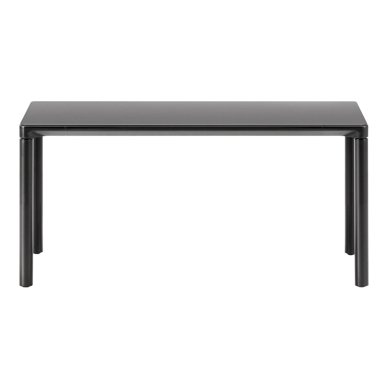 Sleek, modern black dining table with a smooth, glossy finish and clean lines, perfect for contemporary spaces.