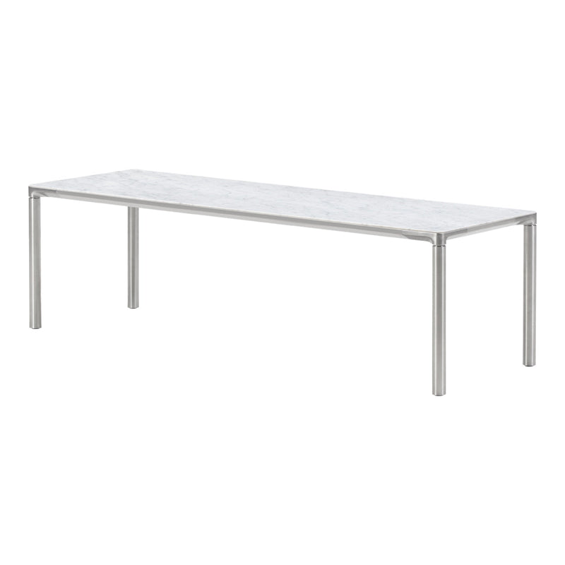 "Long rectangular table with a sleek white marble top and silver metal legs, featuring a smooth, minimalist design."